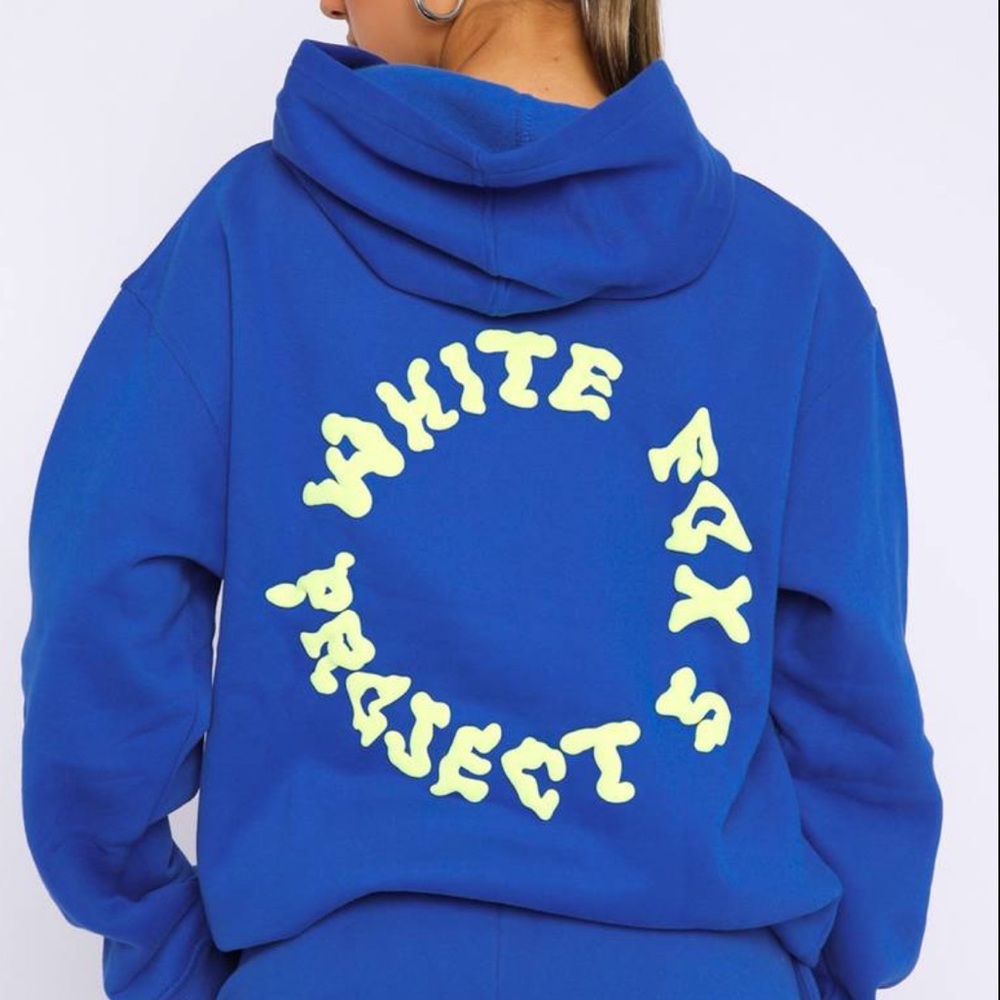 White Fox Boutique Blue Hoodie with Yellow Graphic